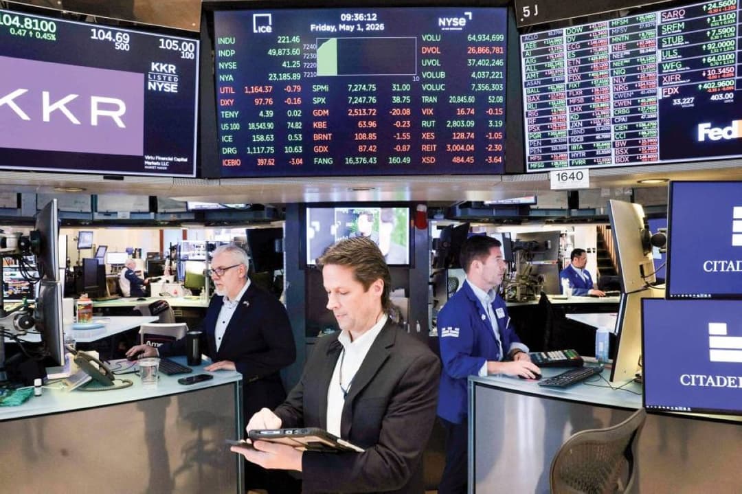 A trader monitors stock market data on screens at a US financial exchange amid gains driven by the technology sector.
