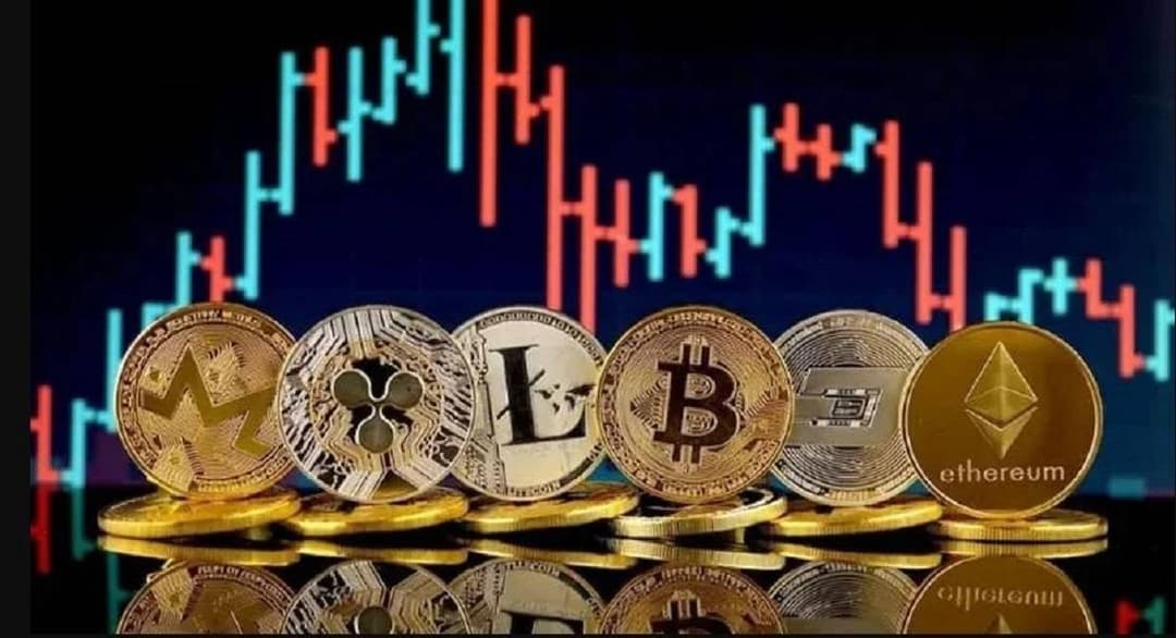 A digital display showing cryptocurrency price charts in the red, reflecting the sharp market-wide decline recorded during the first week of June.