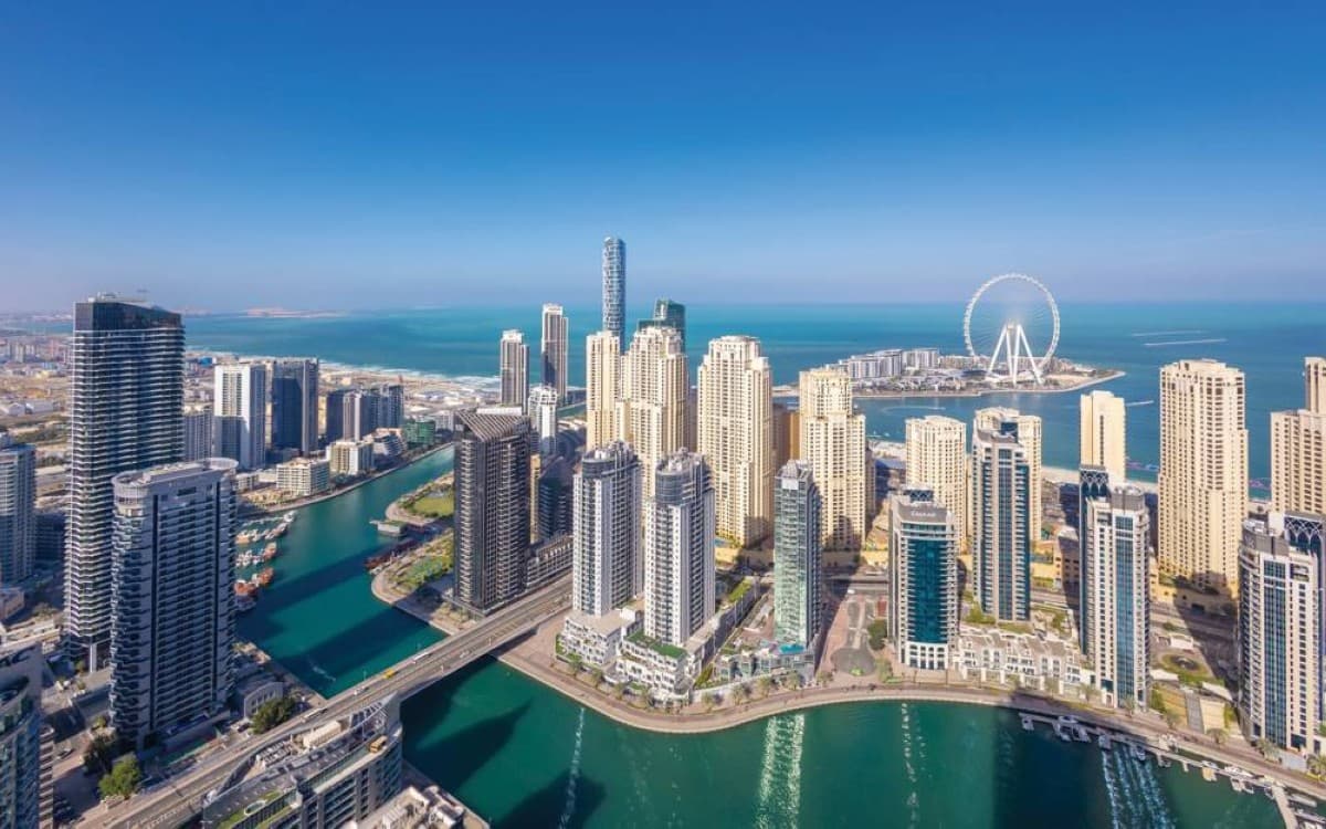 Aerial view of Dubai's residential apartment towers and waterfront developments reflecting the city's booming real estate market.