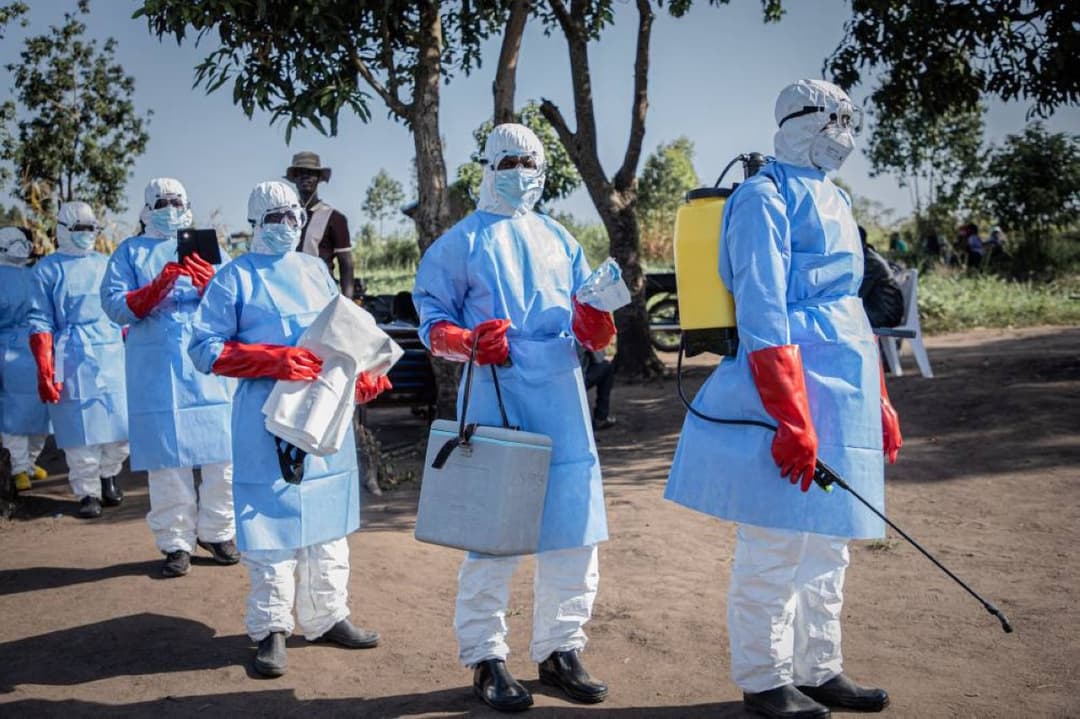 Health workers in protective equipment respond to an Ebola outbreak in the Democratic Republic of Congo.