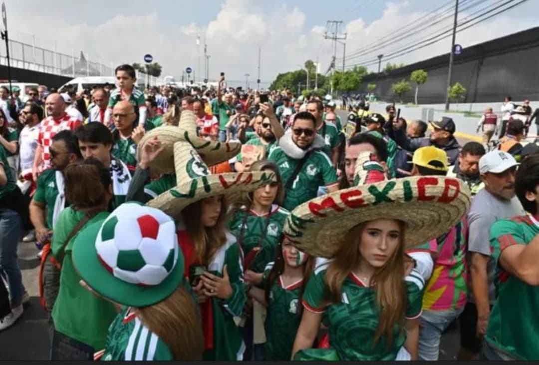 A World Cup 2026 stadium exterior with commercial signage covered, displaying the tournament's neutral venue branding.