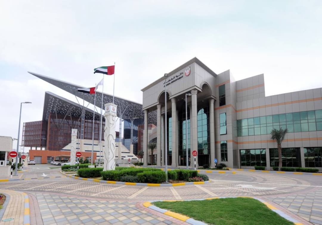 A digital interface representing the Abu Dhabi Judicial Department's electronic services and attestation system.