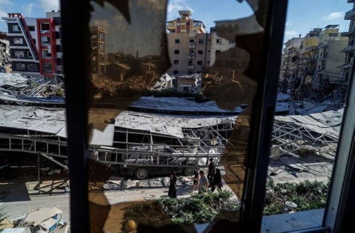Smoke rises over a town in southern Lebanon following an Israeli airstrike targeting vehicles in the Nabatieh district.