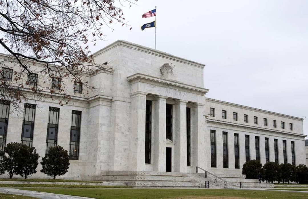 Federal Reserve building representing the US central bank's decision to hold interest rates steady under new chair Kevin Warsh.