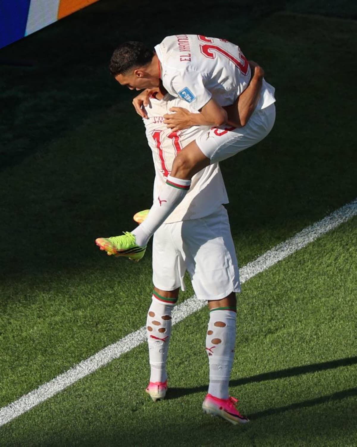 Morocco players celebrate their 1-0 victory over Scotland at the 2026 World Cup group stage.