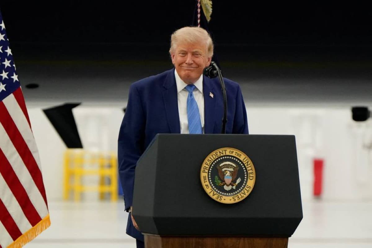 Donald Trump speaking, with the Strait of Hormuz referenced in the context of US-Iran nuclear negotiations.