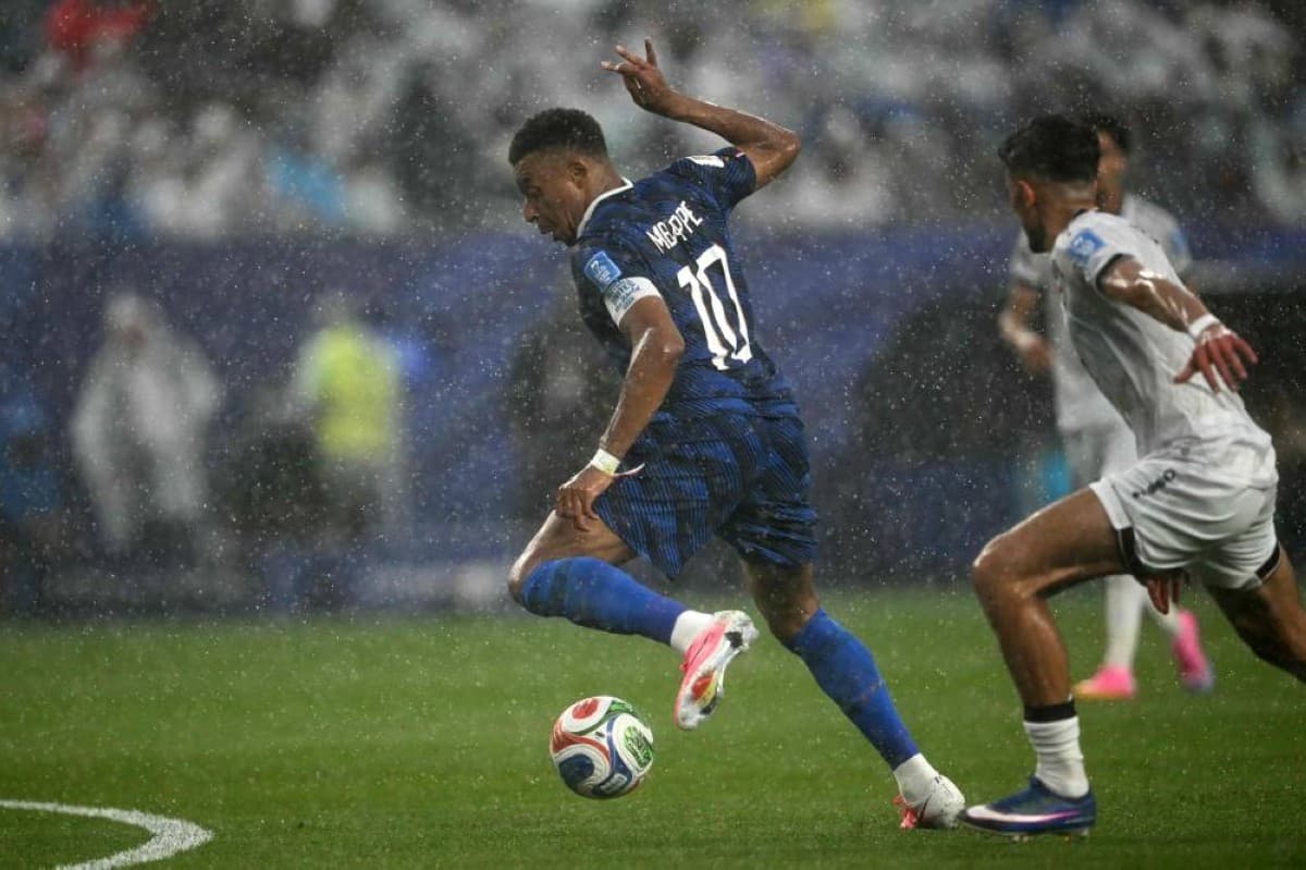 Players and officials leave the pitch at Lincoln Financial Field in Philadelphia as the France vs Iraq World Cup 2026 match is suspended due to a thunderstorm.