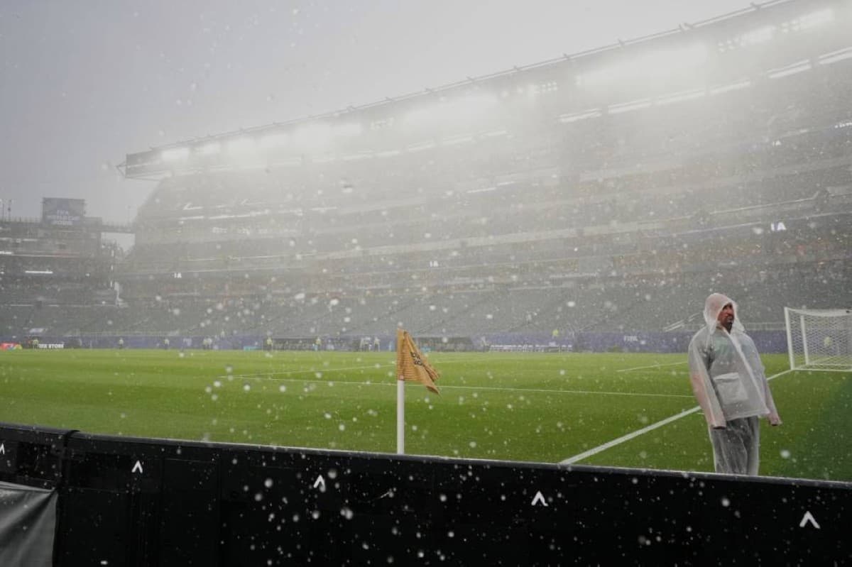 Spain's players walking off the training pitch in Chattanooga, Tennessee, as a thunderstorm forces the cancellation of their World Cup training session.
