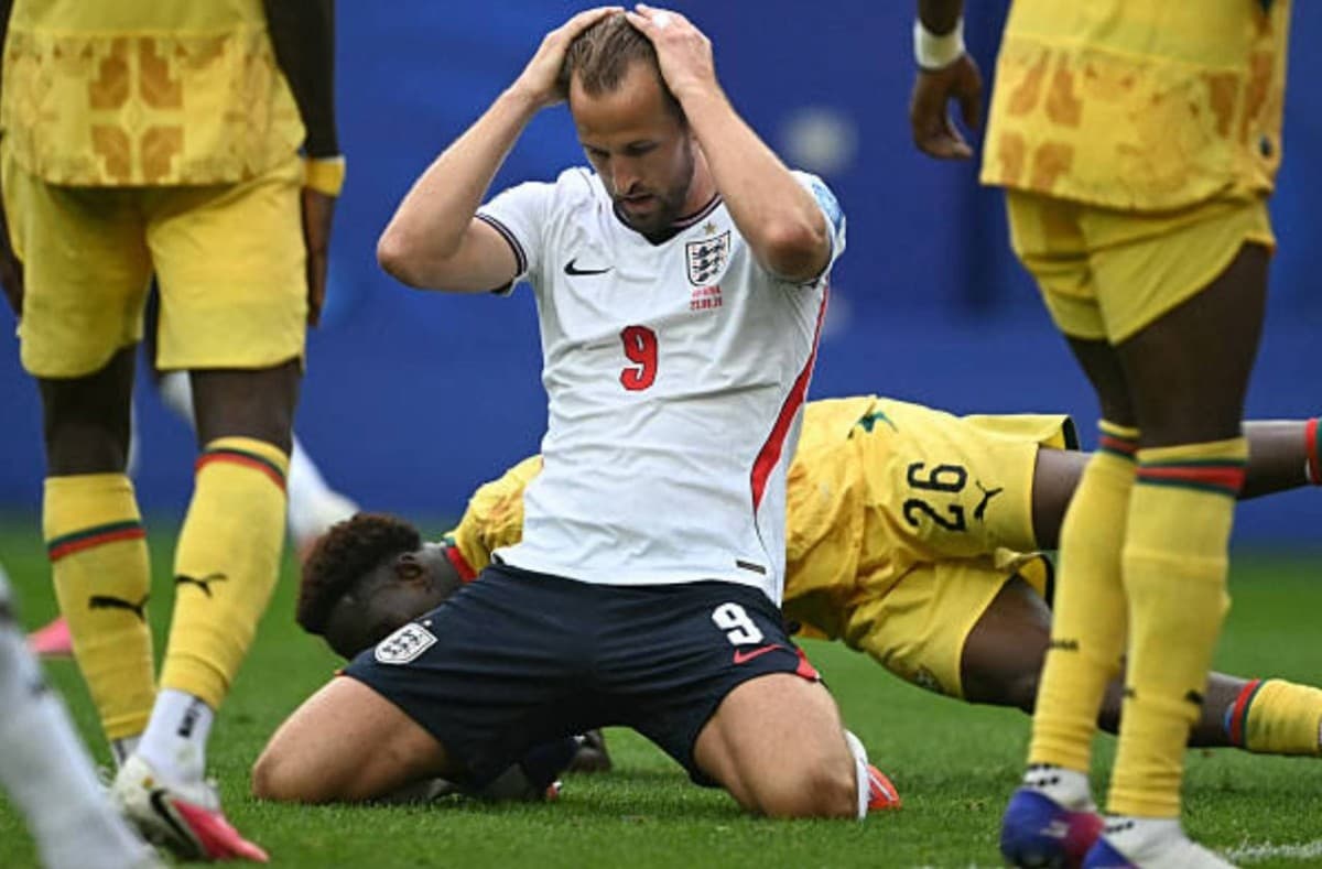 England players looking frustrated on the pitch during their goalless draw against Ghana in a 2026 World Cup qualifier.