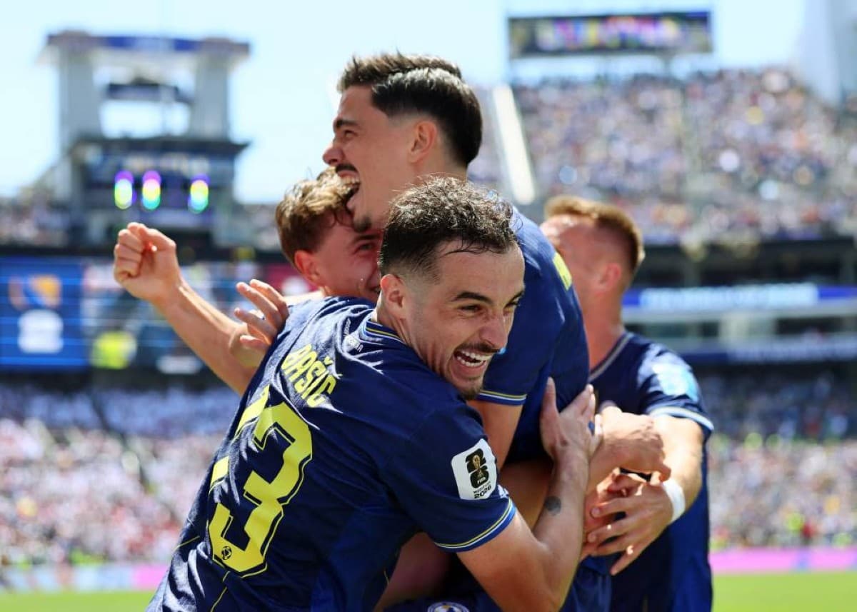 Bosnia and Herzegovina players celebrate a goal against Qatar during their 3-1 victory in a World Cup qualifier match.