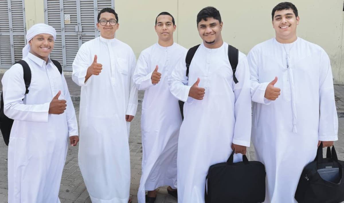 Grade 12 students arriving at an examination centre in the UAE to sit their mathematics end-of-year exam.