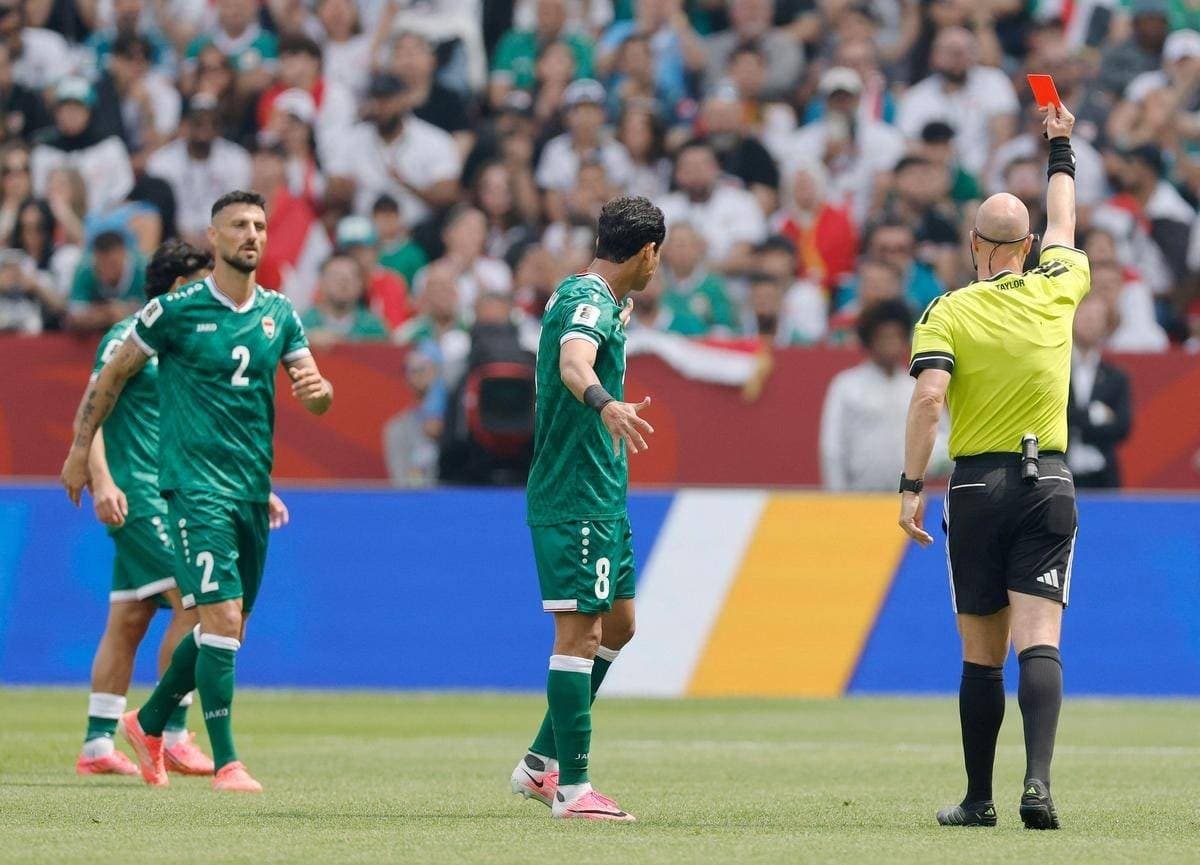 Iraq's Ribin Sulaka receives a red card during the 2026 World Cup Group 9 match against Senegal.