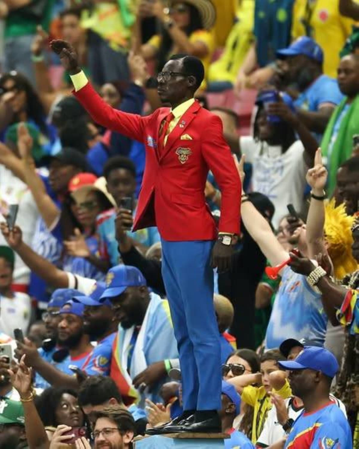 Michel Koka Mbouladinga, the Democratic Republic of Congo's most recognisable fan, dressed in tribute to Patrice Lumumba at a football match.