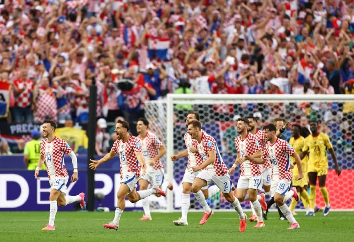 Croatia players celebrate after scoring against Ghana during their World Cup 2026 qualifying match.