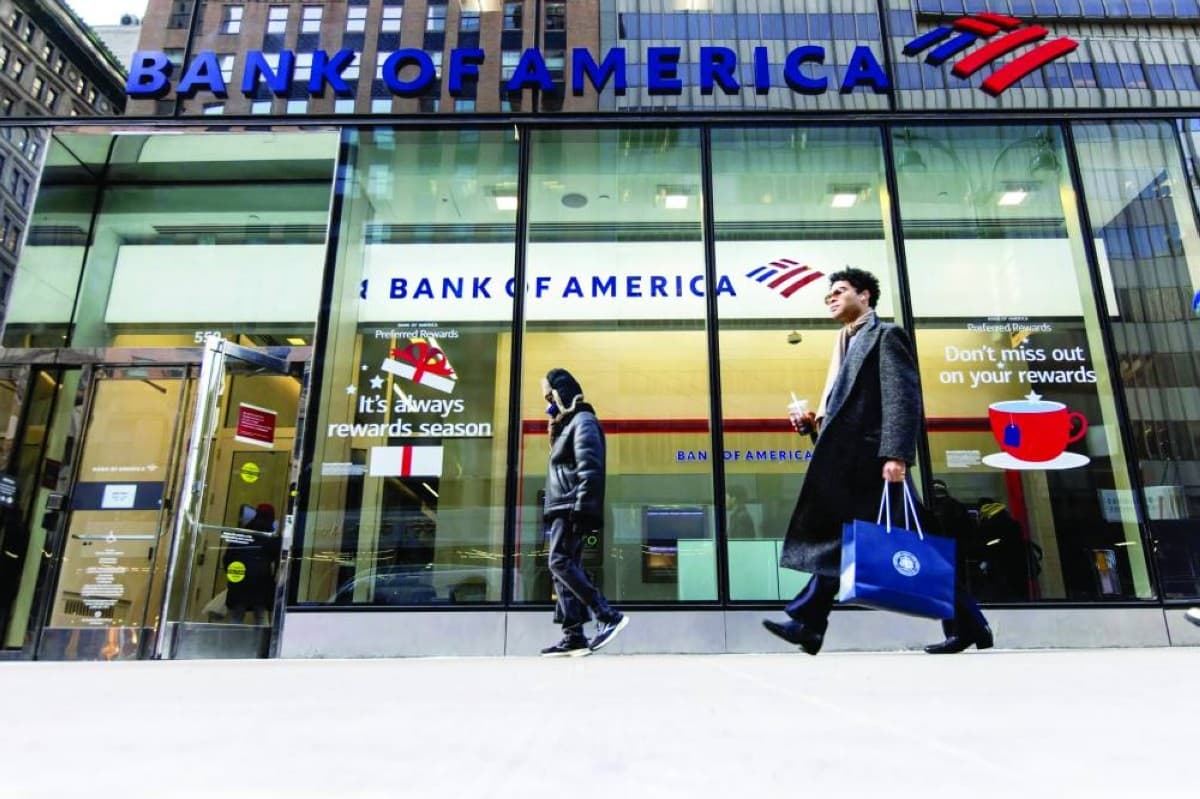 A Bank of America logo displayed outside one of the bank's branches, representing the institution's latest mid-year global economic outlook report.