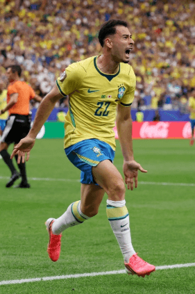 Brazil players celebrate a late winning goal against Japan in their 2026 FIFA World Cup group stage match.