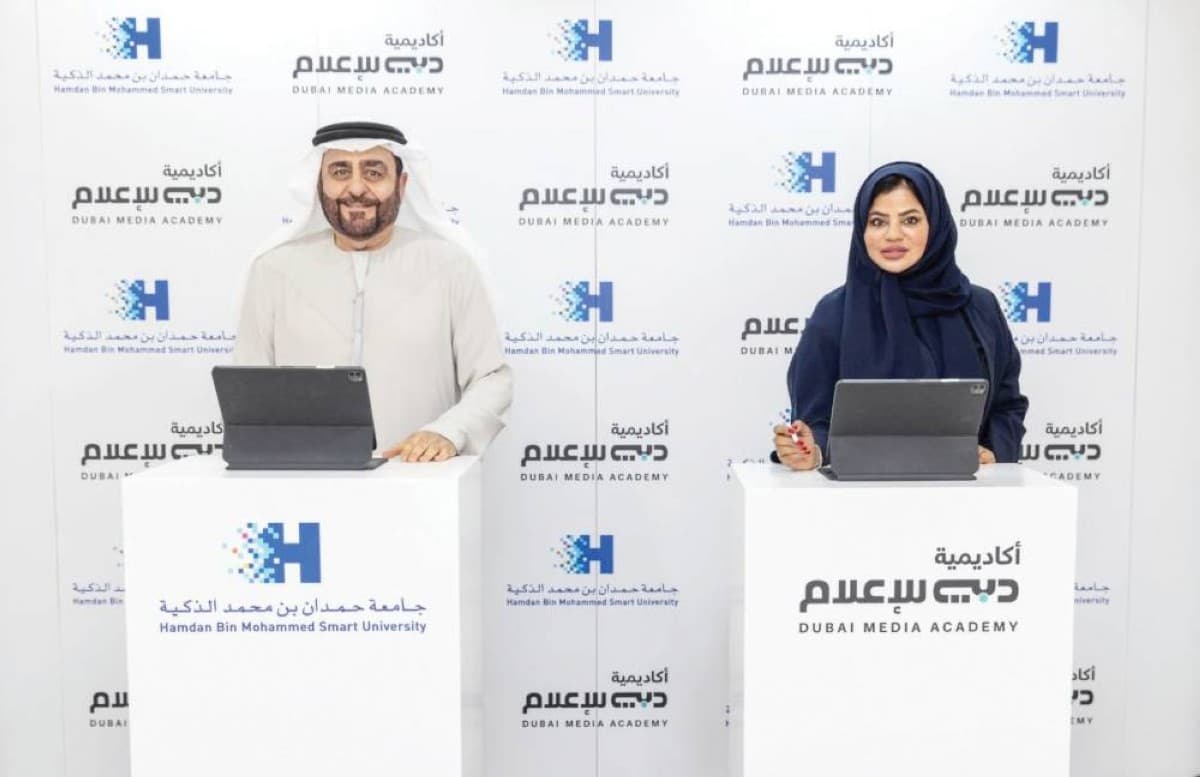 Officials from Dubai Media Academy and Hamdan Bin Mohammed Smart University sign a memorandum of understanding on media education and digital innovation cooperation.