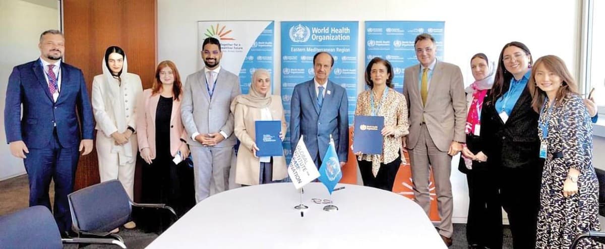 Representatives of GLIDE and the WHO Regional Office for the Eastern Mediterranean sign a strategic partnership agreement at the WHO office in Geneva.