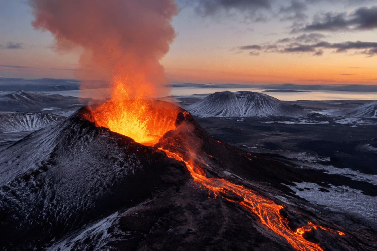 An active volcano erupting with lava flows, illustrating the volcanic activity discussed in the article.
