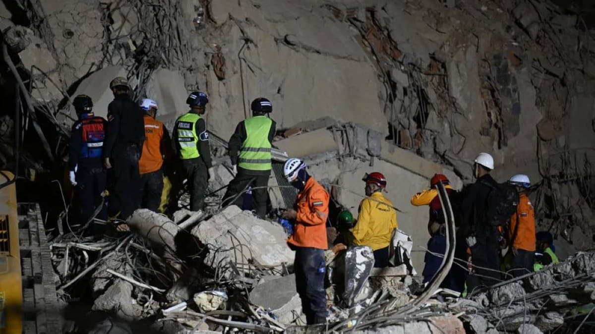 Rescue workers and emergency personnel responding to earthquake damage in Venezuela.