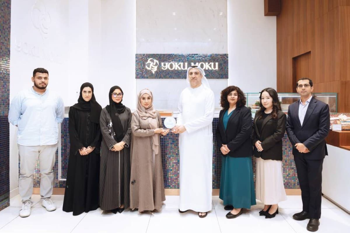 Three restaurant brands receiving the Dubai Waqf Mark award from the Mohammed bin Rashid Global Centre for Endowment and Gift Consultancy.