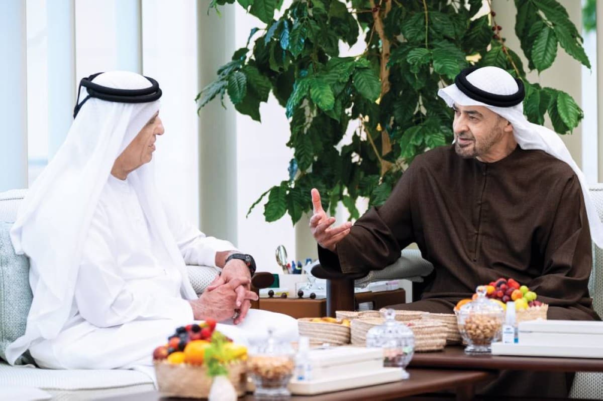 Sheikh Mohamed bin Zayed Al Nahyan meets with Sheikh Saud bin Saqr Al Qasimi during a gathering attended by senior UAE officials and dignitaries.