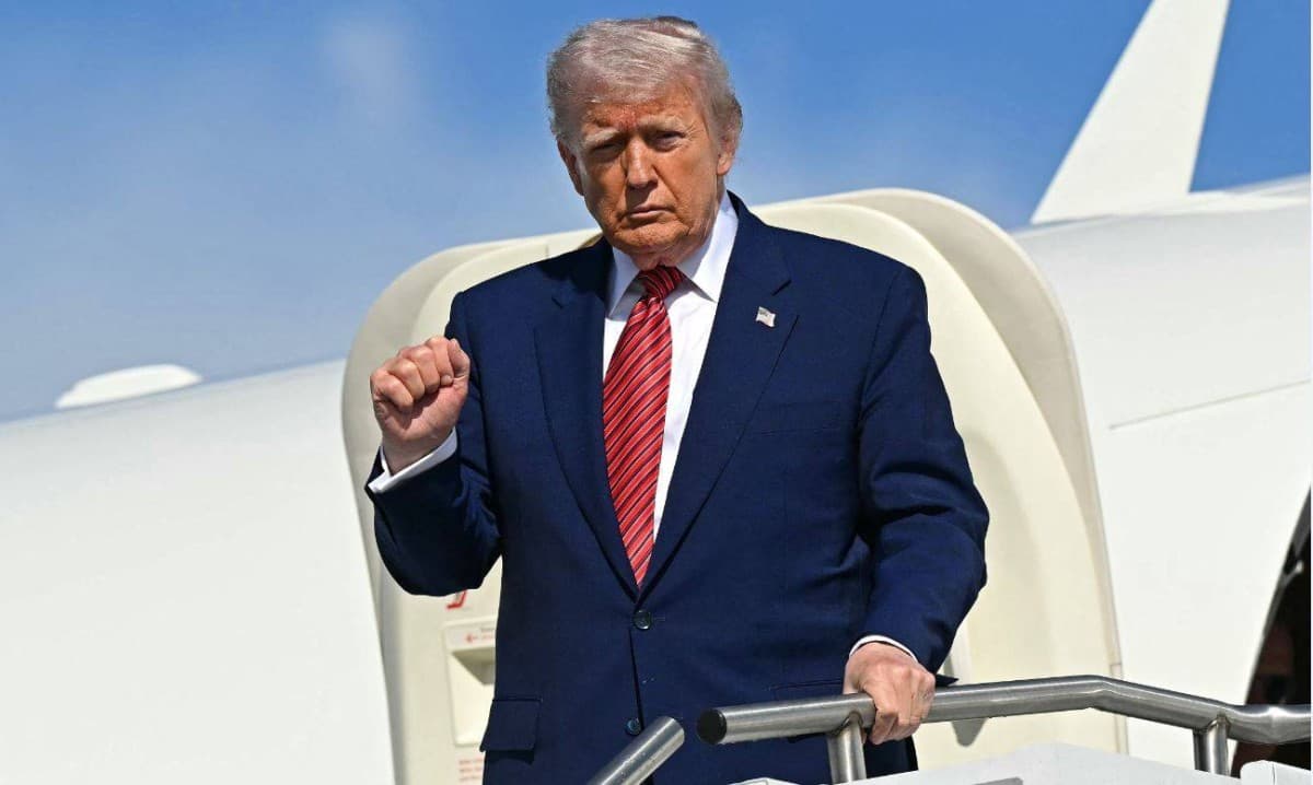 US President Donald Trump speaking to reporters as he departs Joint Base Andrews.