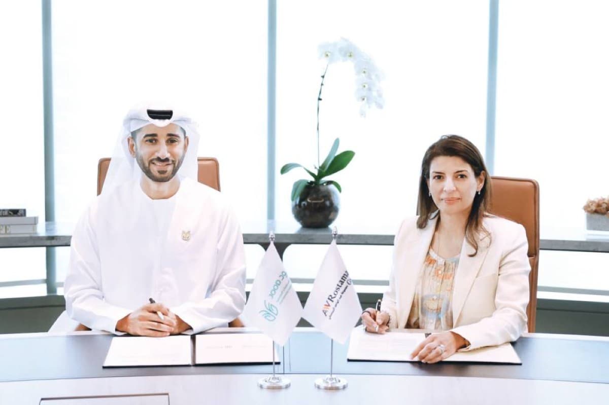 Signing ceremony between Abdul Wahid Al Rostamani Group and Dubai Foundation for Community Contributions Jood representatives.