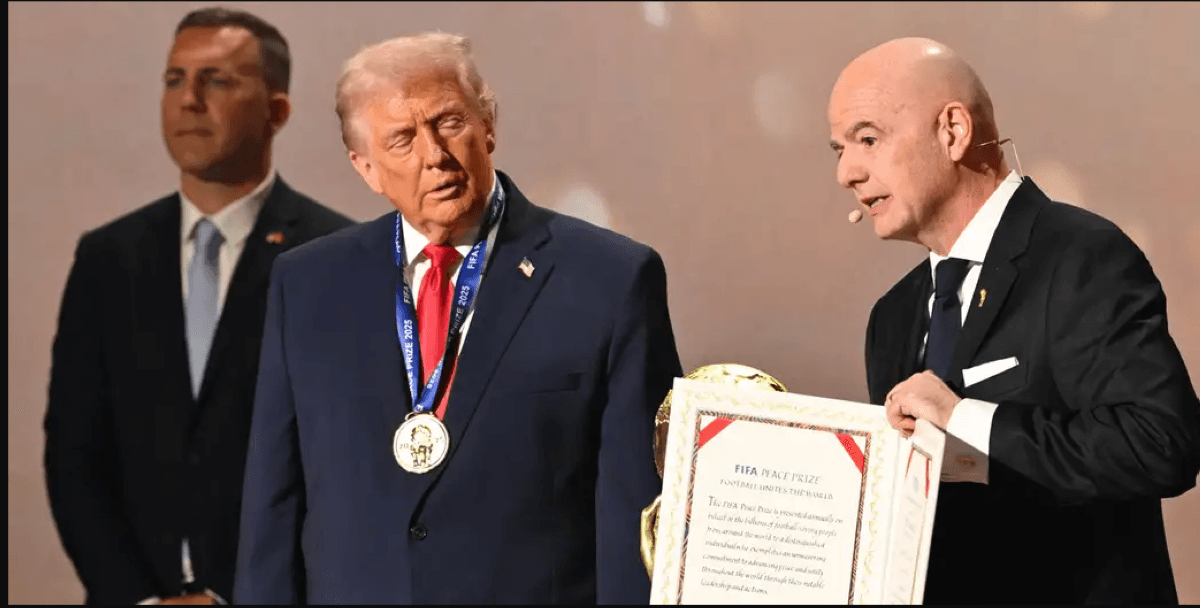 FIFA President Gianni Infantino presenting the inaugural FIFA Peace Prize to US President Donald Trump.