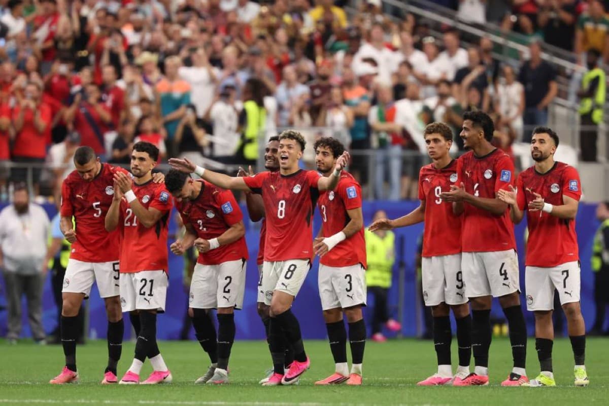 Egypt players celebrate after defeating Australia in a penalty shootout to advance to the round of 16 at the 2026 FIFA World Cup.