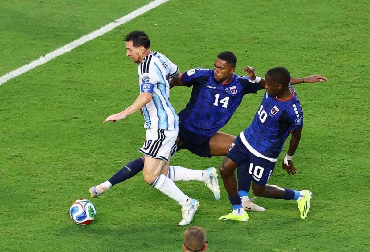 Argentina players celebrate after advancing past Cape Verde in a gruelling World Cup match that went to extra time.