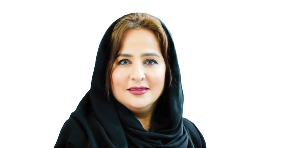 Dr. Amal Al Malla Al Mheiri, consultant in obstetrics and gynaecology and founder of the Her Wellness Way initiative, photographed in a professional setting.