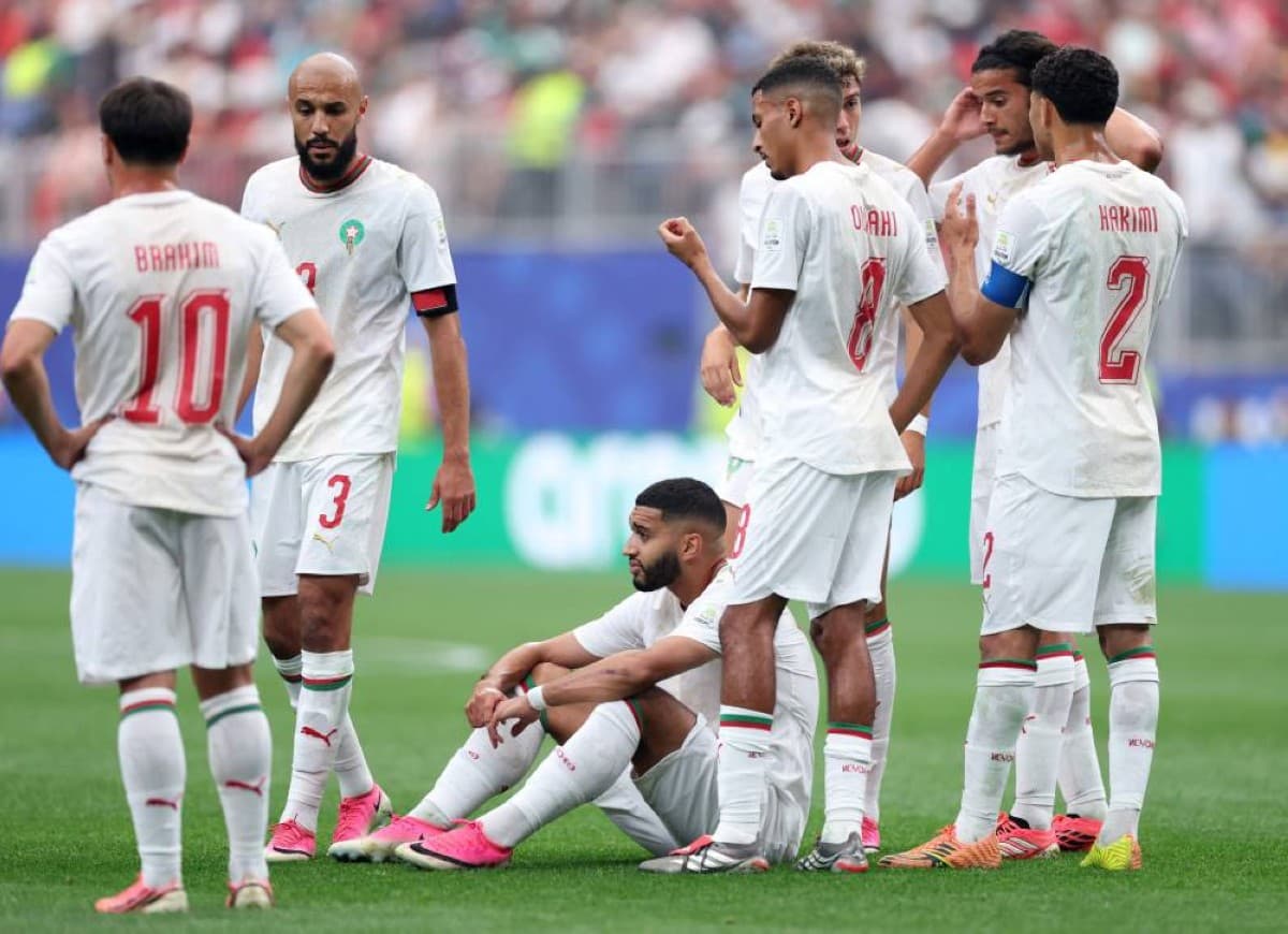 Morocco striker Ismail Saibari being helped off the pitch during the 2026 World Cup Round of 16 match against Canada in Houston.