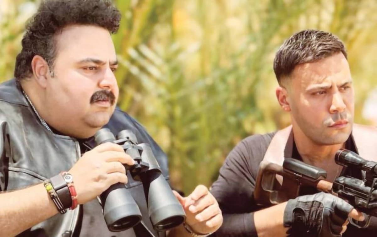 Two Egyptian film stars posing together at a cinema promotional event, representing the artistic duo trend driving a revival at the Egyptian box office.