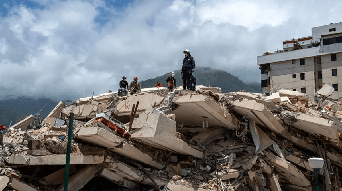 Rescue workers and emergency personnel survey damage caused by the powerful earthquakes that struck Venezuela.