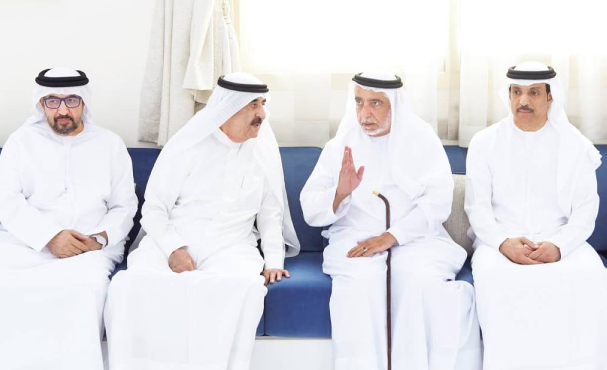 Sheikh Saud bin Rashid Al Mualla offering condolences at the Amin Al Sharafa Council in Ajman following the death of Mansour Saif Al Zaabi.