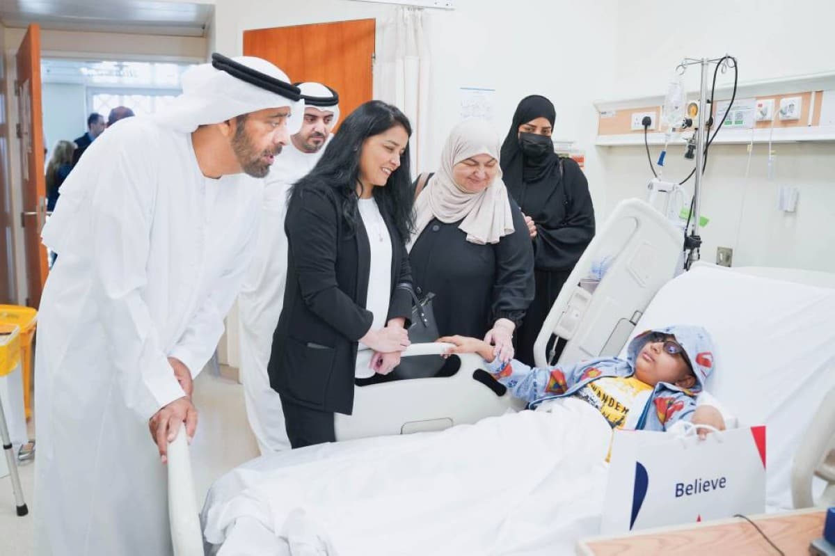 A visit to the oncology department at Tawam Hospital, where a cancer survivor rings the Bell of Life to mark the completion of her treatment.