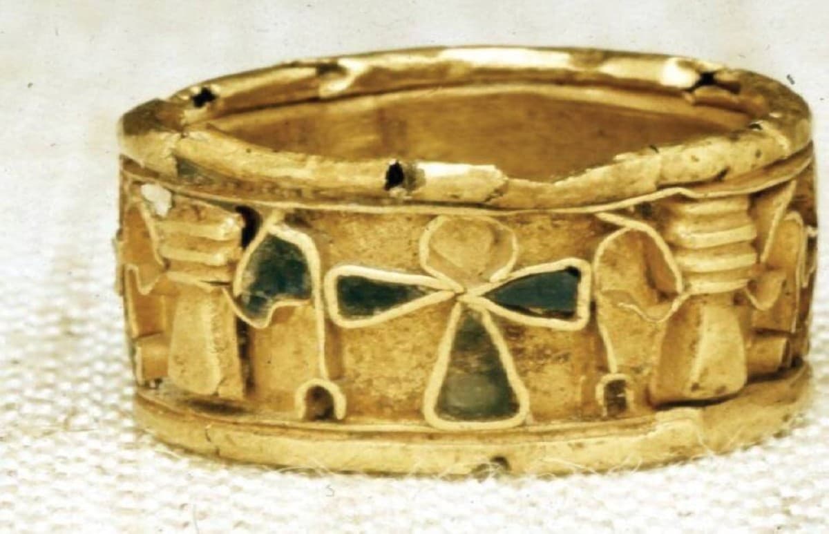 A bronze Ptolemaic-era ring engraved with a profile portrait of Egyptian Queen Arsinoe III, discovered during archaeological excavations in Anapa, Russia.