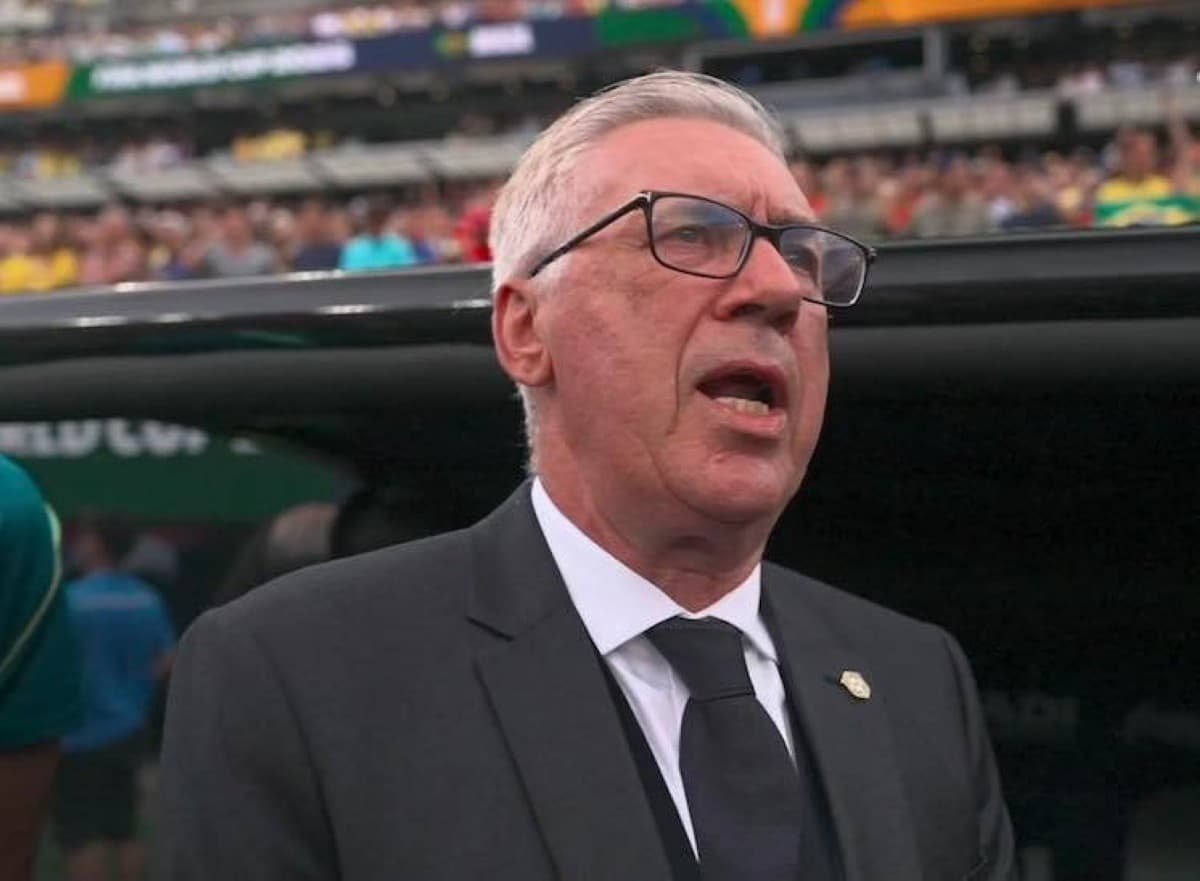 Carlo Ancelotti singing the Brazilian national anthem pitchside ahead of Brazil's World Cup Round of 16 match against Norway at MetLife Stadium.