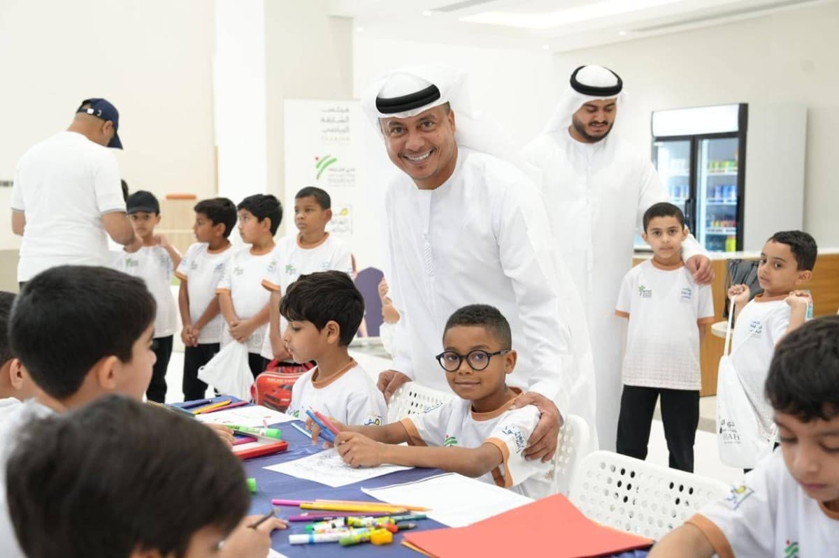 Children and participants at the opening day of the Sharjah Self-Defence Sports Club's 'Otlatna Ghair' summer sports programme.