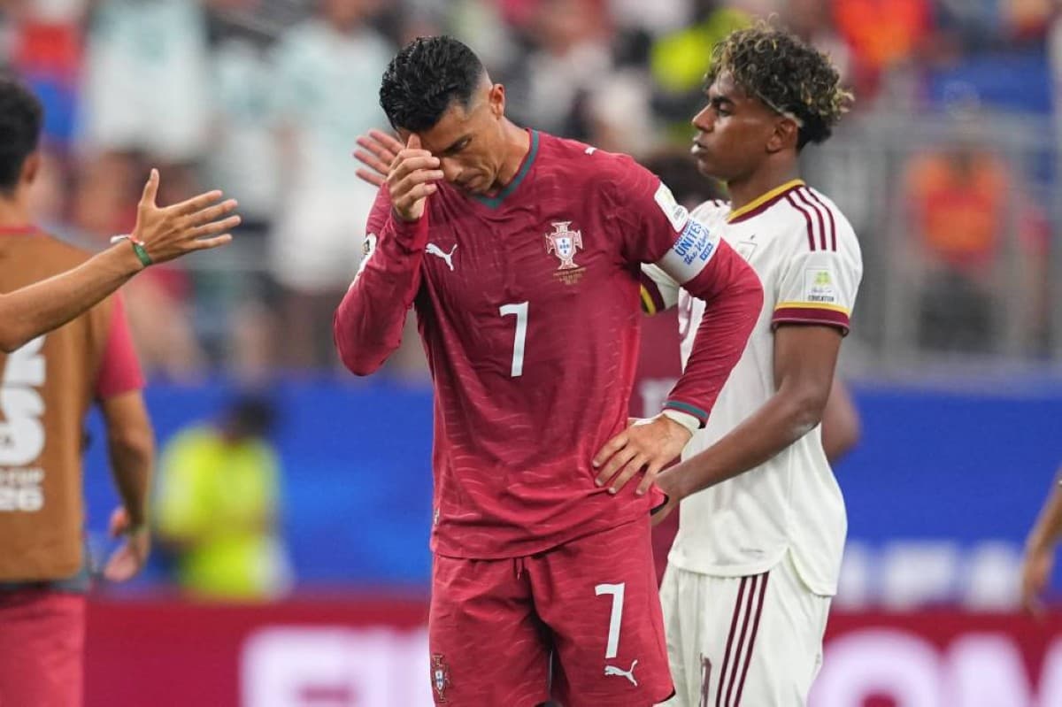 Cristiano Ronaldo walks off the pitch looking dejected after Portugal's elimination from the 2026 World Cup following a defeat to Spain in Dallas.