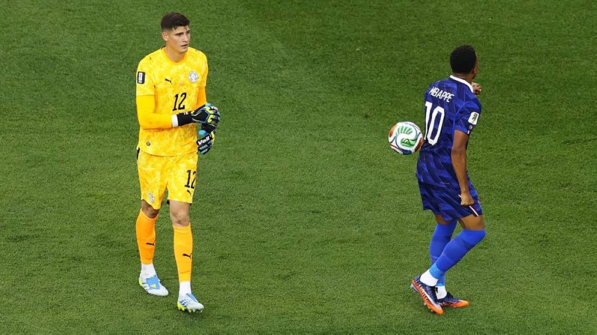 Kylian Mbappé celebrating after scoring the winning penalty for France against Paraguay in the World Cup round of 16.