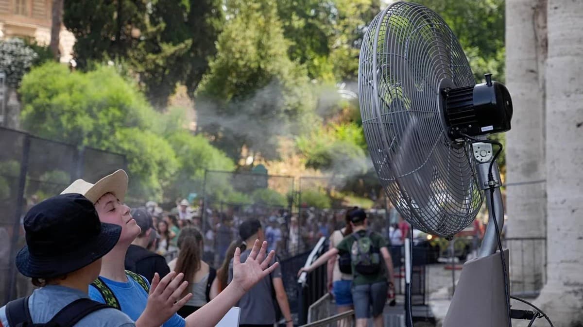 People seeking shade during a severe heatwave in a European city as temperatures soar.