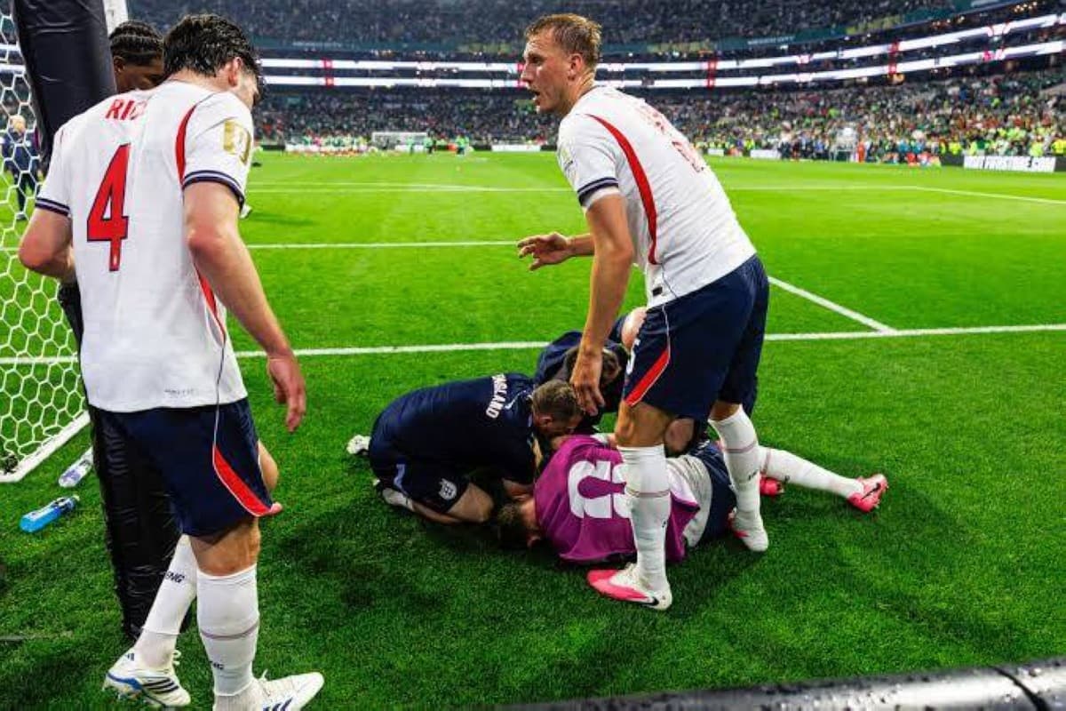 Jordan Henderson lying in a hospital bed following surgery on his left arm after a fall during England's World Cup celebrations.