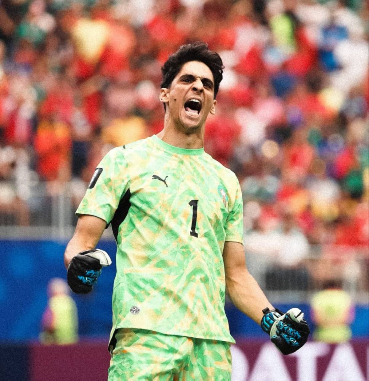 Yassine Bounou, Morocco's goalkeeper, celebrating a penalty save during the 2026 World Cup quarter-final against France.