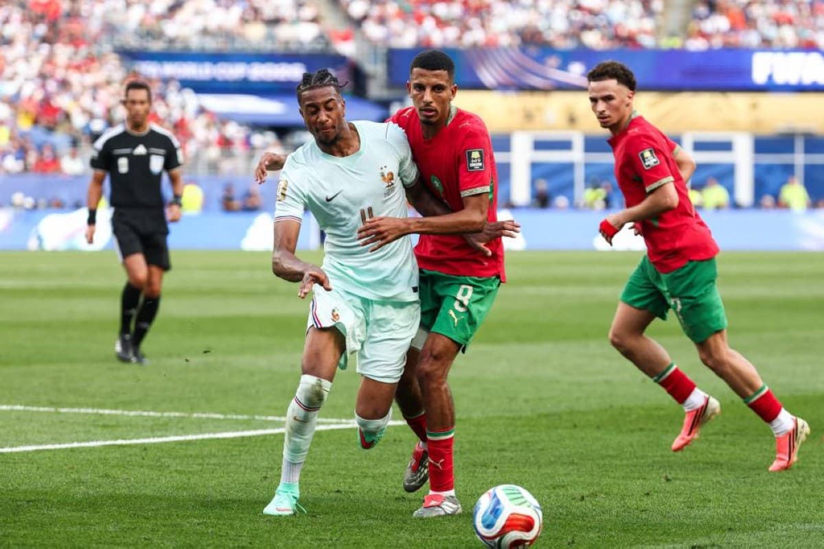 France players celebrate after eliminating Morocco in the 2026 World Cup quarter-finals with goals from Mbappé and Dembélé.