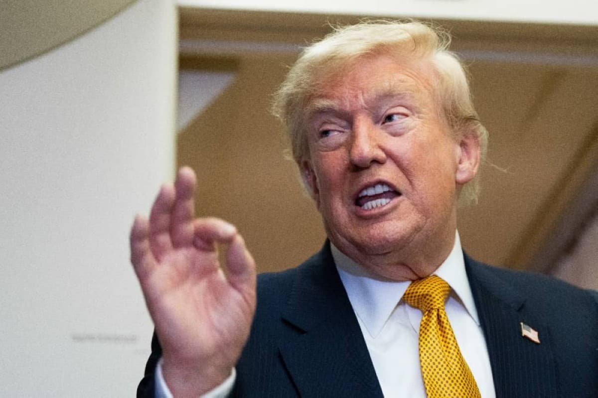 US President Donald Trump speaking at a podium, with the conflict between Washington and Tehran as the backdrop to ongoing ceasefire and peace talks negotiations.