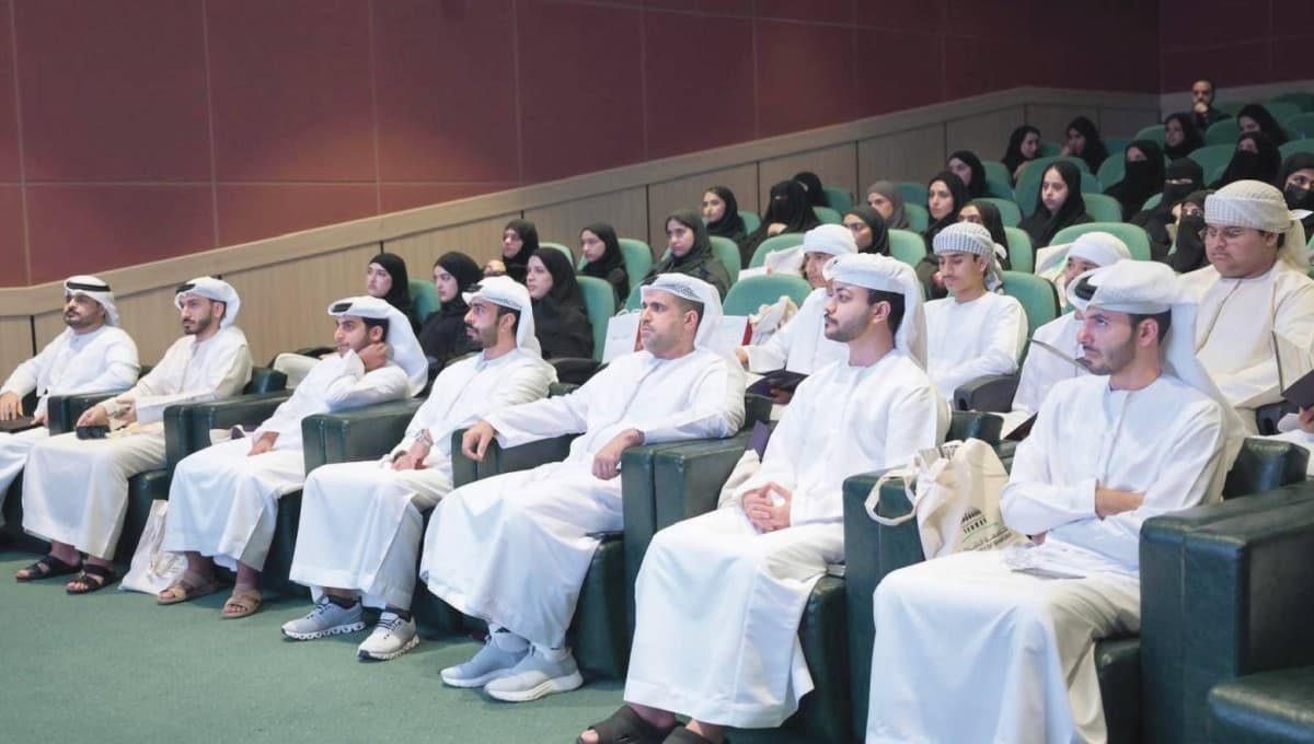 Officials from the Office of Martyrs' Family Affairs and the Khalifa Empowerment Programme 'Aqdar' at the launch of a new package of initiatives for the children and families of martyrs.