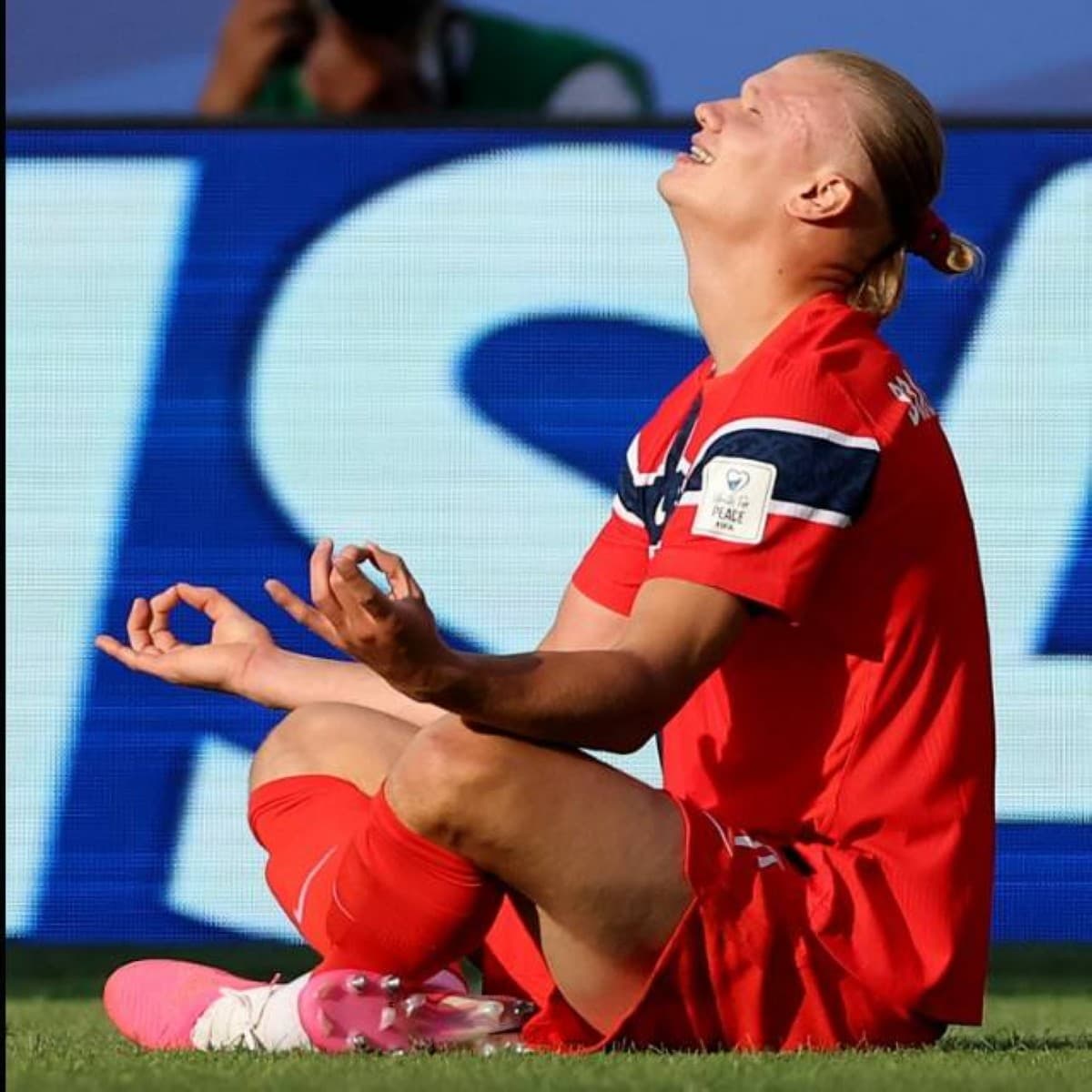 Erling Haaland celebrating during the 2026 FIFA World Cup, with fans in the background.