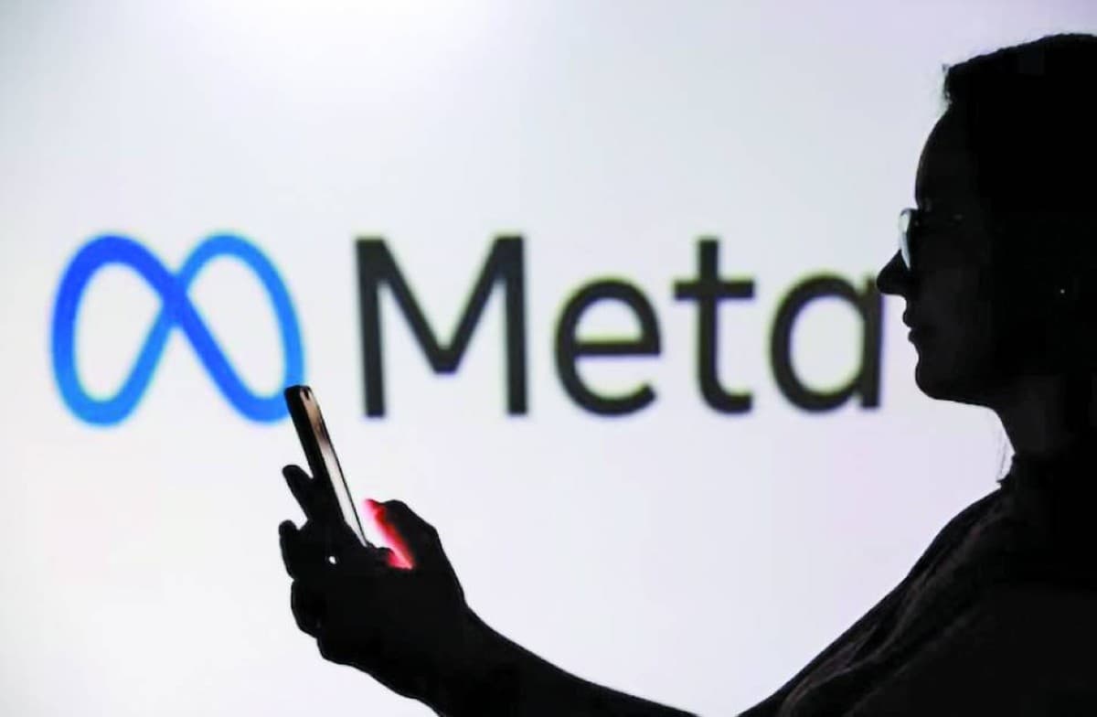 A smartphone screen showing the Meta logo alongside the Instagram app interface.